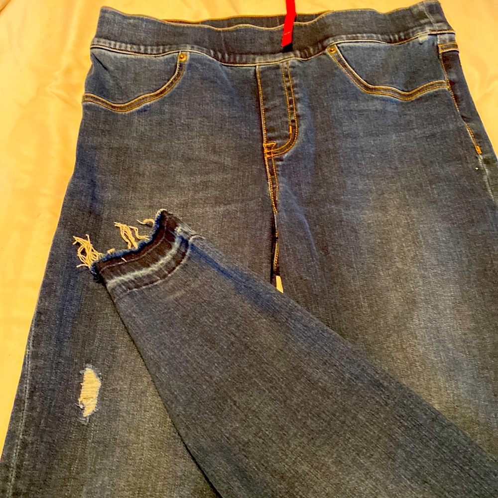 Size medium Spanx jeggings.